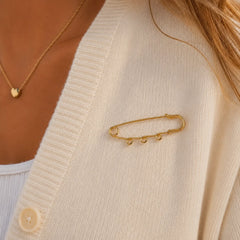 Gold Charm Brooch